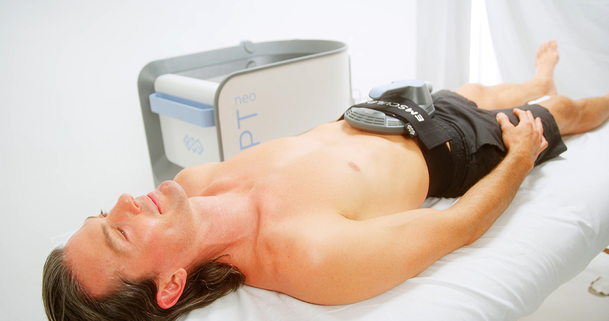Emsculpt Neo product being used on a male's stomach
